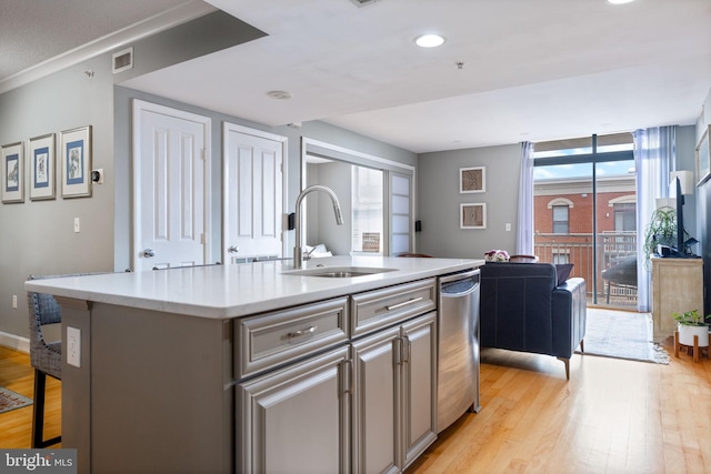 1201 N Garfield St Unit 604, Arlington, VA 22201 - kitchen featuring a sink, stainless steel dishwasher, light wood finished floors, a kitchen island with sink, and recessed lighting