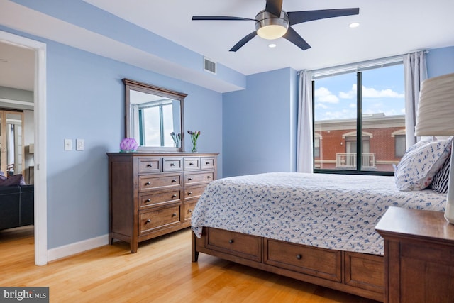 1201 N Garfield St Unit 604, Arlington, VA 22201 - bedroom with light wood-type flooring, access to exterior, recessed lighting, baseboards, and a ceiling fan