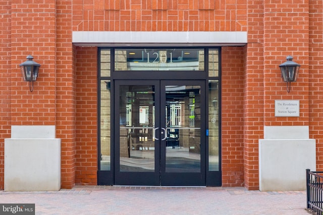 1201 N Garfield St Unit 604, Arlington, VA 22201 - doorway to property featuring french doors and brick siding