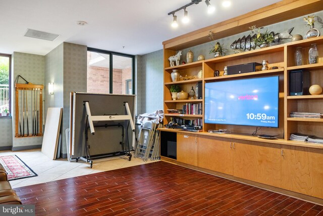 1201 N Garfield St Unit 604, Arlington, VA 22201 - living room featuring wood finished floors and floor to ceiling windows