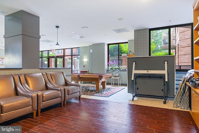 1201 N Garfield St Unit 604, Arlington, VA 22201 - living area featuring billiards, wood finished floors, and wallpapered walls