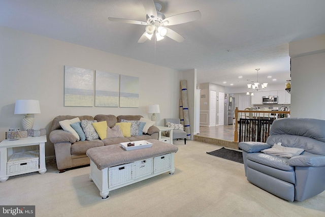 600 Small Reward Rd, Huntingtown, MD 20639 - living room with a chandelier, a ceiling fan, light carpet, and recessed lighting