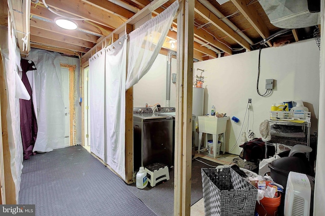 600 Small Reward Rd, Huntingtown, MD 20639 - unfinished below grade area featuring washing machine and clothes dryer