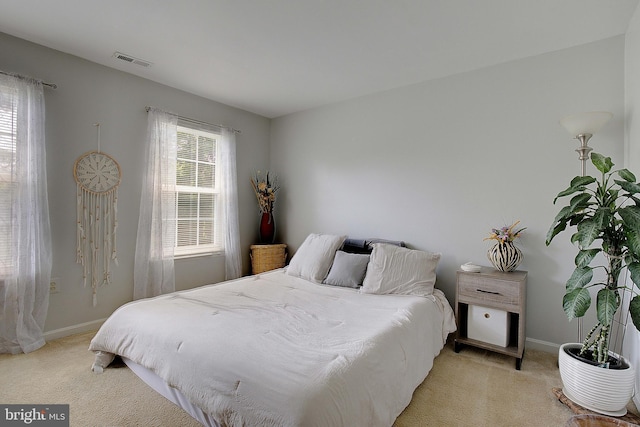 600 Small Reward Rd, Huntingtown, MD 20639 - bedroom featuring light carpet and baseboards