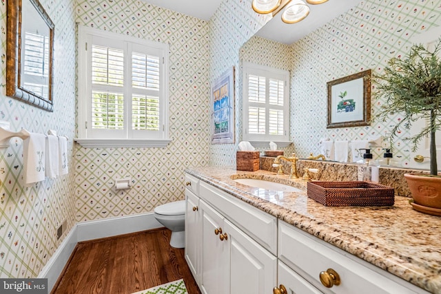 1298 Farm Ln, Berwyn, PA 19312 - bathroom with wood finished floors, toilet, vanity, baseboards, and wallpapered walls