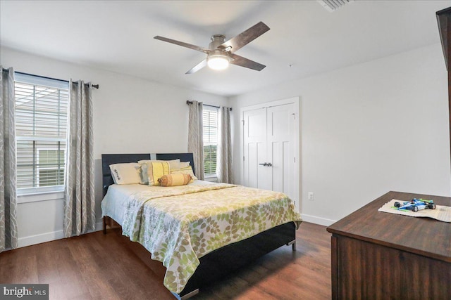 5829 Barts Way, Frederick, MD 21704 - bedroom featuring baseboards, dark wood-style floors, a closet, and a ceiling fan