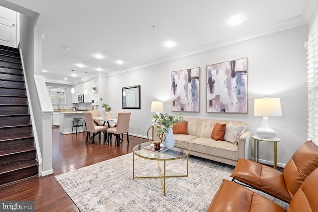 331 K St SE, Washington, DC 20003 - living area with stairs, dark wood-style flooring, crown molding, recessed lighting, and baseboards