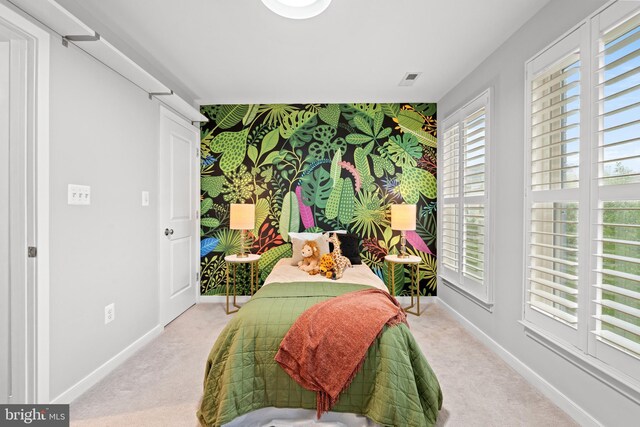 331 K St SE, Washington, DC 20003 - bedroom featuring an accent wall, carpet, baseboards, and wallpapered walls