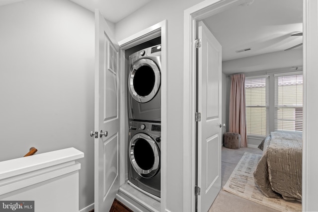 331 K St SE, Washington, DC 20003 - laundry room featuring stacked washing machine and dryer