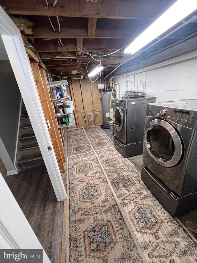 930 Chesaco Ave, Baltimore, MD 21237 - washroom with water heater, independent washer and dryer, and wood finished floors