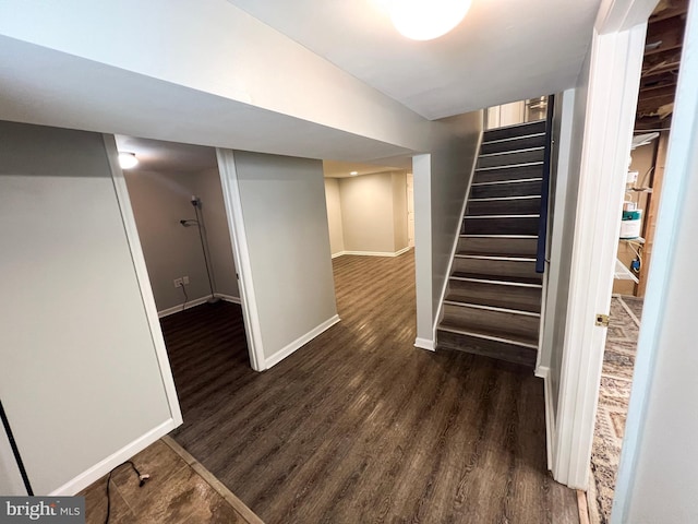 930 Chesaco Ave, Baltimore, MD 21237 - finished basement with dark wood finished floors, stairway, and baseboards
