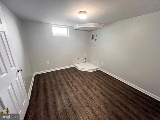 930 Chesaco Ave, Baltimore, MD 21237 - basement with dark wood-type flooring and baseboards