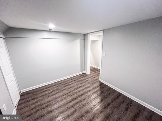 930 Chesaco Ave, Baltimore, MD 21237 - finished below grade area with dark wood-type flooring and baseboards