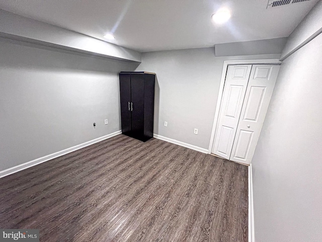 930 Chesaco Ave, Baltimore, MD 21237 - finished basement with dark wood-style flooring, recessed lighting, and baseboards