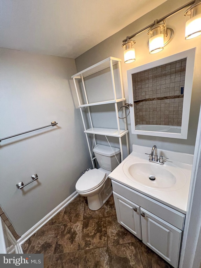 930 Chesaco Ave, Baltimore, MD 21237 - bathroom featuring toilet, vanity, and baseboards