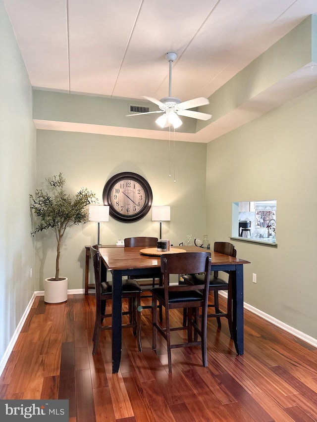 128 Roberts Ln Unit 100, Alexandria, VA 22314 - dining space with a ceiling fan, wood-type flooring, and baseboards