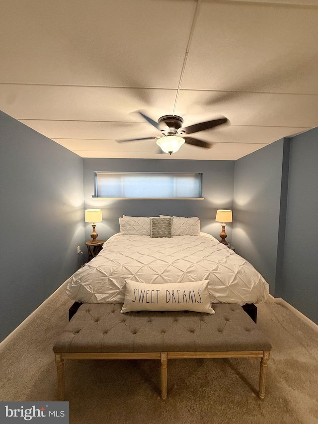 128 Roberts Ln Unit 100, Alexandria, VA 22314 - bedroom featuring carpet flooring, a ceiling fan, and baseboards
