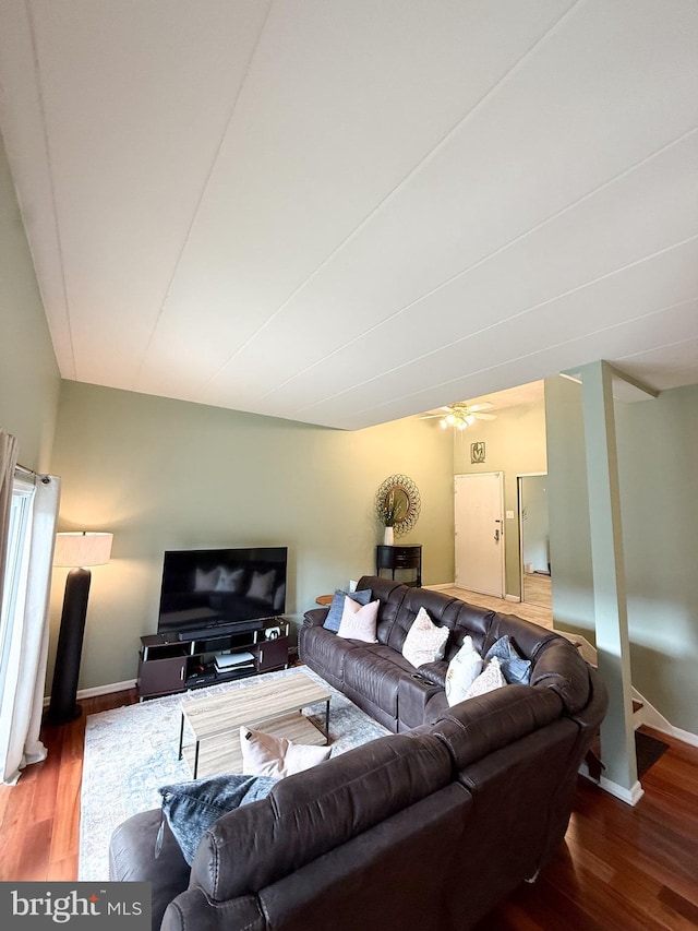 128 Roberts Ln Unit 100, Alexandria, VA 22314 - living area featuring wood finished floors, baseboards, and ceiling fan