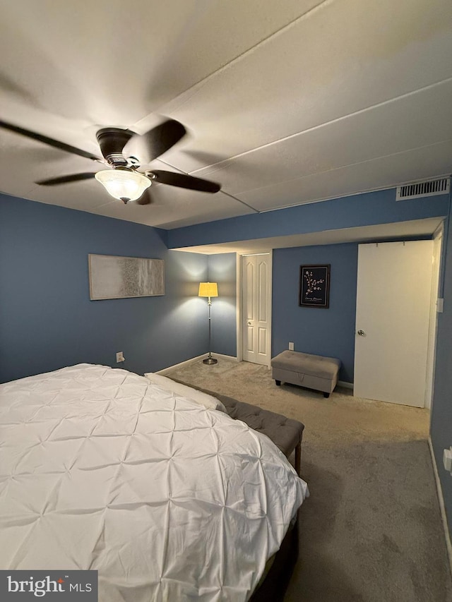 128 Roberts Ln Unit 100, Alexandria, VA 22314 - bedroom with carpet and a ceiling fan