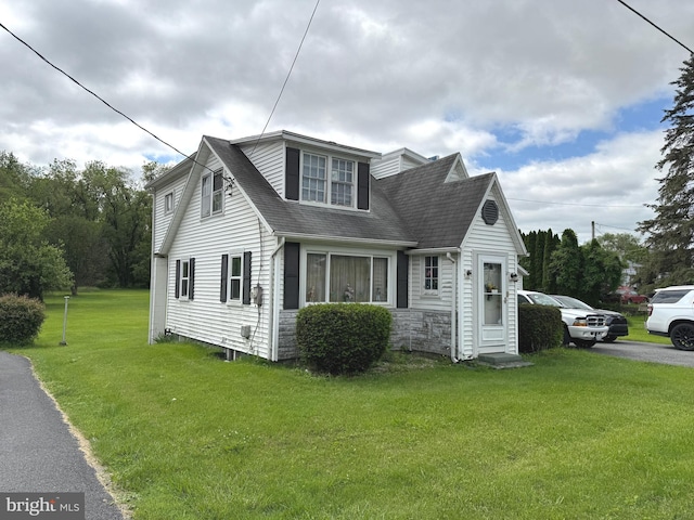 67 Fairfield St, Carlisle, PA 17013 - view of front of home with a front lawn, a shingled roof, and stone siding