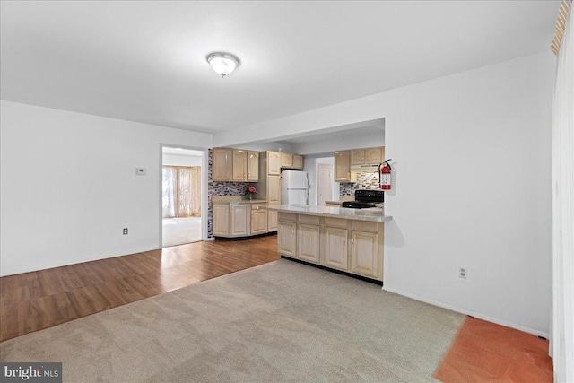 43 Windsor Ln, Willingboro, NJ 08046 - kitchen featuring freestanding refrigerator, black / electric stove, carpet floors, light countertops, and decorative backsplash