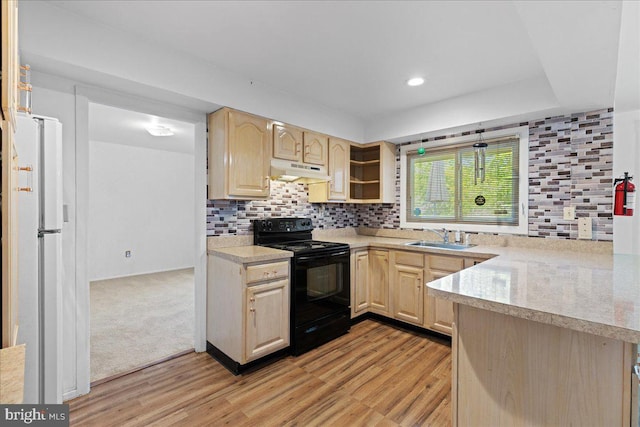 43 Windsor Ln, Willingboro, NJ 08046 - kitchen featuring black / electric stove, freestanding refrigerator, under cabinet range hood, light brown cabinetry, and a sink