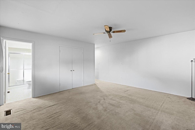 43 Windsor Ln, Willingboro, NJ 08046 - unfurnished bedroom featuring carpet floors, connected bathroom, a closet, and ceiling fan