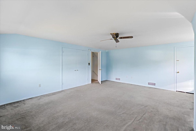 43 Windsor Ln, Willingboro, NJ 08046 - unfurnished bedroom featuring carpet floors, vaulted ceiling, ceiling fan, and a closet