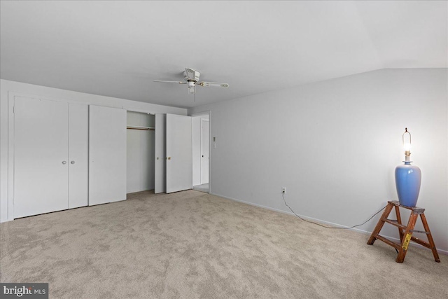 43 Windsor Ln, Willingboro, NJ 08046 - unfurnished bedroom with carpet, lofted ceiling, a ceiling fan, and baseboards