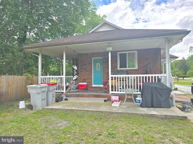 300 N Orchard Rd, Vineland, NJ 08360 - view of front of house featuring brick siding and covered porch
