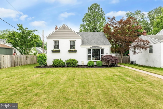 808 Scotia Rd, Philadelphia, PA 19128 - back of property featuring a chimney, stucco siding, and roof with shingles