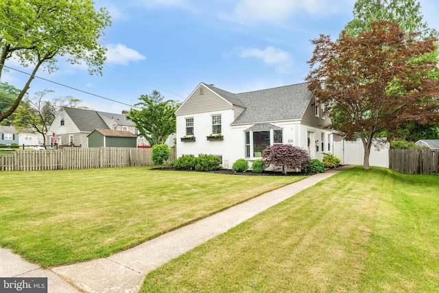 808 Scotia Rd, Philadelphia, PA 19128 - back of property featuring roof with shingles and stucco siding