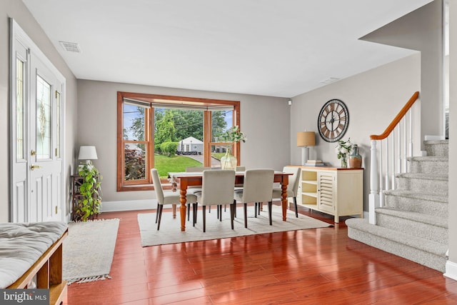 808 Scotia Rd, Philadelphia, PA 19128 - dining space with stairway, wood finished floors, and baseboards