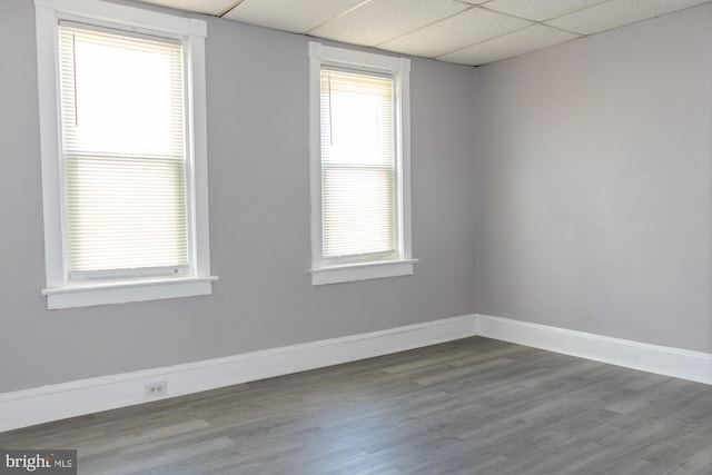 229 New Trent, Ewing, NJ 08638 - unfurnished room featuring dark wood-style flooring, a drop ceiling, and baseboards