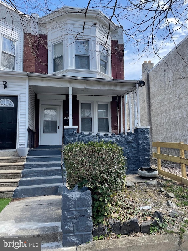 1453 N 60th, Philadelphia, PA 19151 - view of front of home featuring brick siding and covered porch