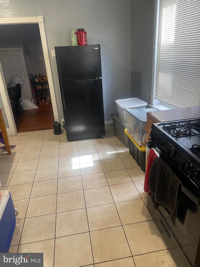 1453 N 60th, Philadelphia, PA 19151 - kitchen featuring black appliances and light tile patterned floors