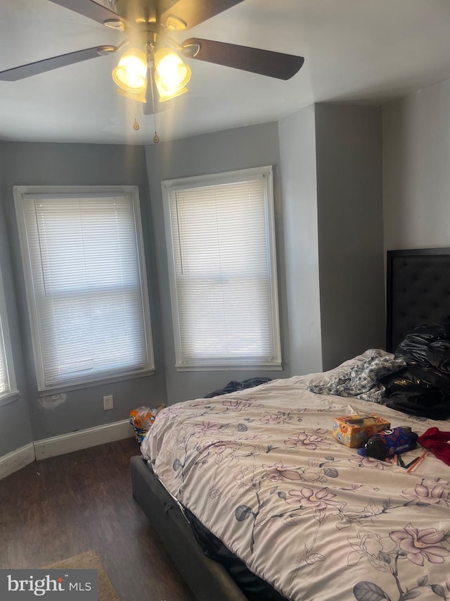 1453 N 60th, Philadelphia, PA 19151 - bedroom featuring dark wood finished floors, baseboards, multiple windows, and a ceiling fan