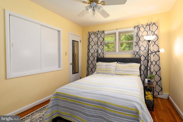 1030 Rock Creek Dr, Wyncote, PA 19095 - bedroom with baseboards, wood finished floors, and ceiling fan