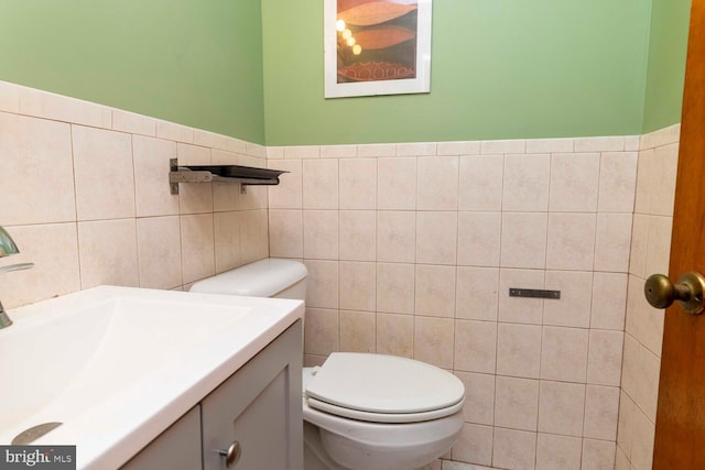 1030 Rock Creek Dr, Wyncote, PA 19095 - bathroom featuring toilet, tile walls, and vanity