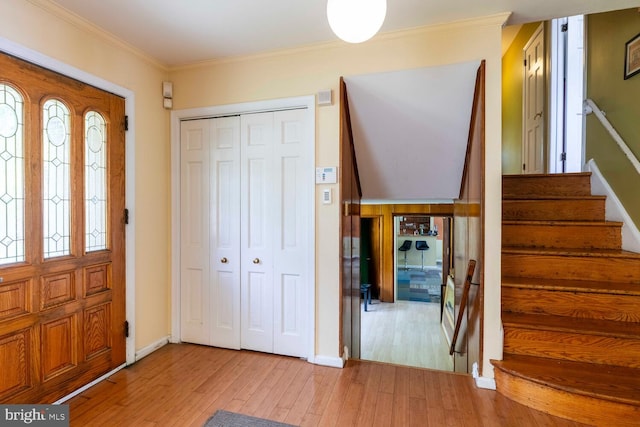 1030 Rock Creek Dr, Wyncote, PA 19095 - foyer with hardwood / wood-style floors, stairs, ornamental molding, and baseboards