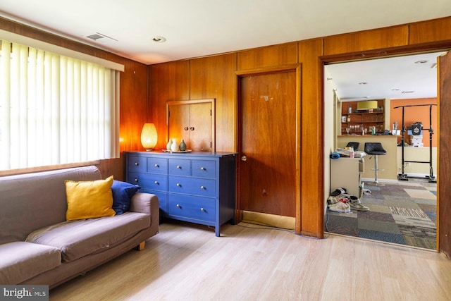 1030 Rock Creek Dr, Wyncote, PA 19095 - living area with light wood-style flooring and wood walls