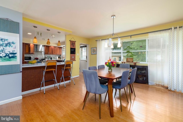 1030 Rock Creek Dr, Wyncote, PA 19095 - dining room with light wood-type flooring and baseboards