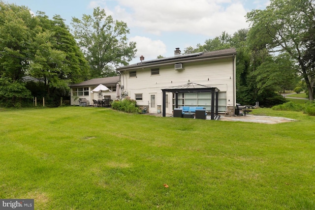 1030 Rock Creek Dr, Wyncote, PA 19095 - back of house featuring a gazebo, a patio area, a yard, and a chimney