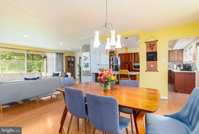1030 Rock Creek Dr, Wyncote, PA 19095 - dining area with plenty of natural light and light wood-type flooring