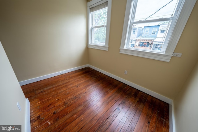 846 W 34th St W, Baltimore, MD 21211 - empty room featuring baseboards and dark wood finished floors