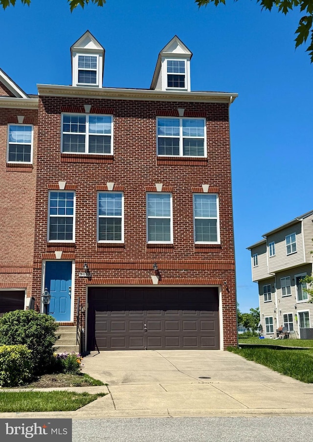 5059 Ottawa Park Pl, Waldorf, MD 20602 - view of property with an attached garage, concrete driveway, and brick siding
