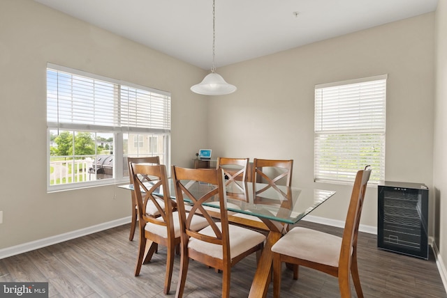5059 Ottawa Park Pl, Waldorf, MD 20602 - dining area featuring beverage cooler, wood finished floors, and baseboards