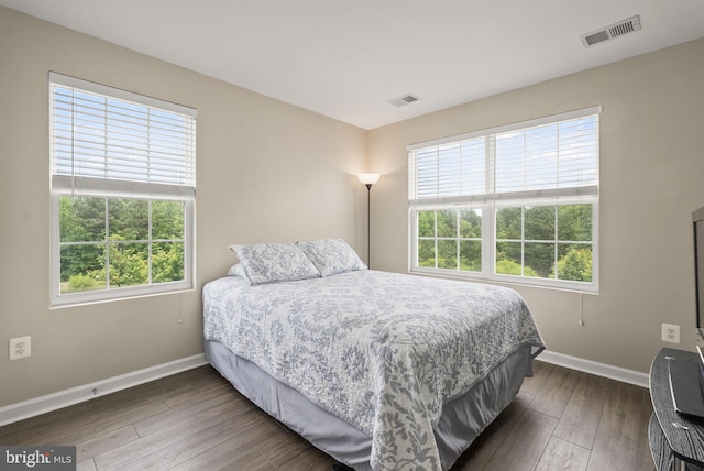 5059 Ottawa Park Pl, Waldorf, MD 20602 - bedroom with baseboards and dark wood finished floors