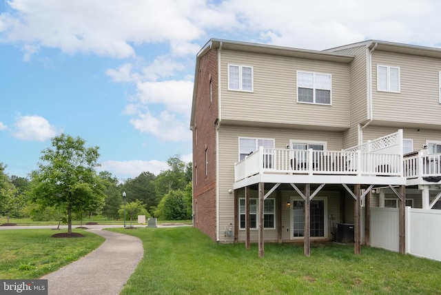 5059 Ottawa Park Pl, Waldorf, MD 20602 - rear view of house featuring a yard, a wooden deck, and central AC
