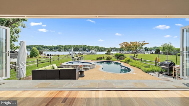 22 E Lake Dr, Annapolis, MD 21403 - swimming pool featuring a patio area, an in-ground hot tub, a water view, and area for grilling